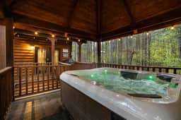 NEW! Pine Cabin w/ Hot Tub, Game Room, Playground - Image 3