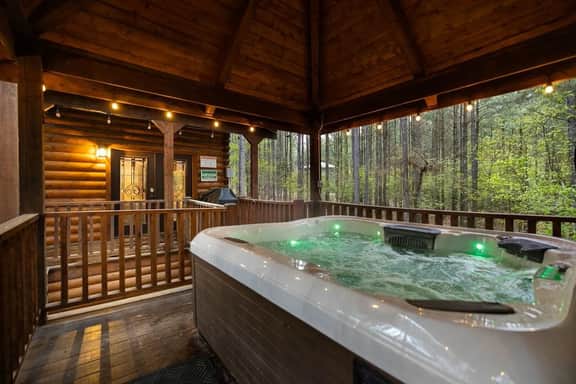 NEW! Pine Cabin w/ Hot Tub, Game Room, Playground - Image 3